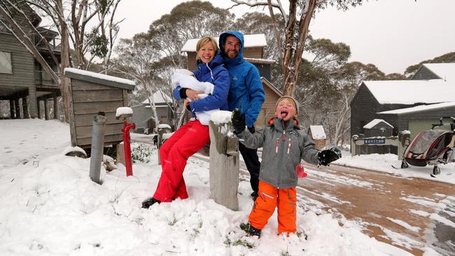 Fiona Battershill and Karl Gray, with Ethan, 3, and Aidan, five weeks, at home in Dinner Plain, northeast Victoria, population 233. Picture: Stuart McEvoy.