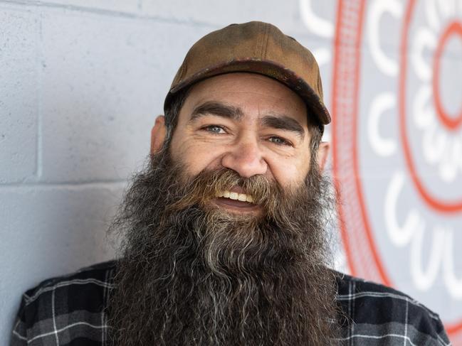 NEWTOWN, VIC - JUNE 22ND, 2023 - Norm Stanley is a First Nations artist who has a passion for sharing his culture. He is currently painting a mural at Chilwell Primary School. Photo : Ginger + Mint