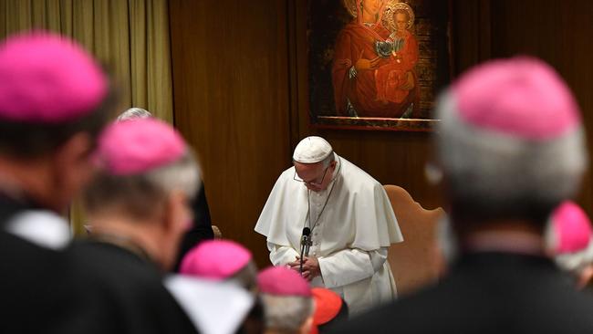 Pope Francis prays during the opening of the Catholic Church’s global child protection summit at the Vatican. Picture: AFP 