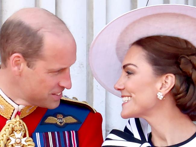 LONDON, ENGLAND - JUNE 15: Prince William, Prince of Wales and Catherine, Princess of Wales on the balcony during Trooping the Colour at Buckingham Palace on June 15, 2024 in London, England. Trooping the Colour is a ceremonial parade celebrating the official birthday of the British Monarch. The event features over 1,400 soldiers and officers, accompanied by 200 horses. More than 400 musicians from ten different bands and Corps of Drums march and perform in perfect harmony. (Photo by Chris Jackson/Getty Images)