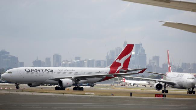 Qantas and Jetstar have scrapped plans for more than 1000 flights next month between Sydney and Queensland. Picture: NCA NewsWire / Christian Gilles