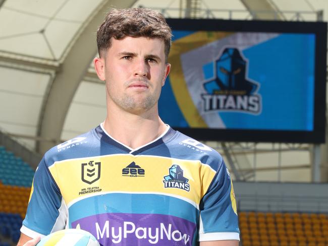 Titans unveiling big new brand refresh to coincide with launch of club's new 10-year plan. Toby Sexton wears new jerseyi at CBUS Stadium. Picture Glenn Hampson