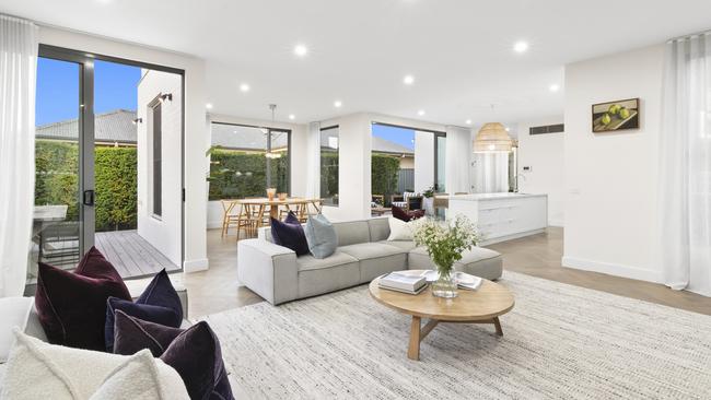 The open-plan living area is bathed in northern light.