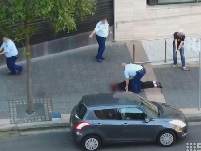 The 15-year-old lays dead outside police HQ