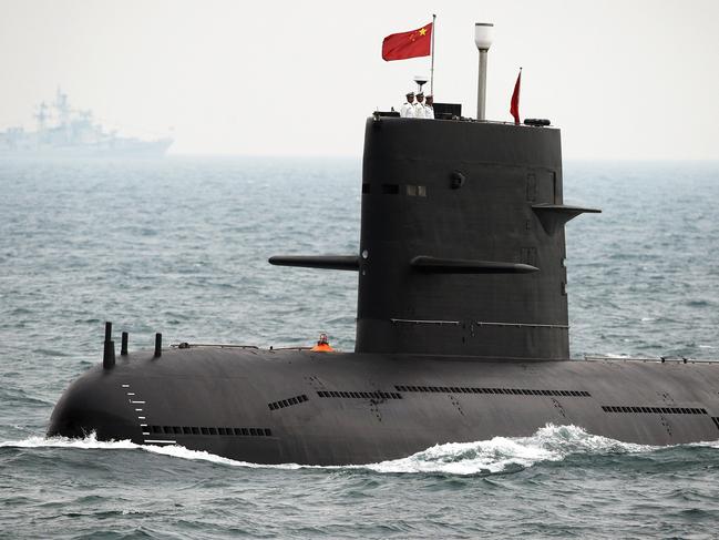 A Chinese Navy submarine attends an international fleet review to celebrate the 60th anniversary of the founding of the People's Liberation Army Navy off Qingdao in Shandong Province, China, 23/04/2009.