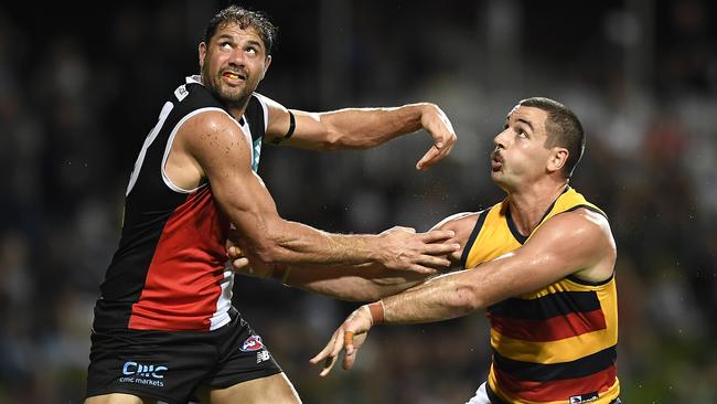 Paddy Ryder and Taylor Walker clash at Cazalys Stadium. Picture: Albert Perez/AFL Photos/via Getty Images