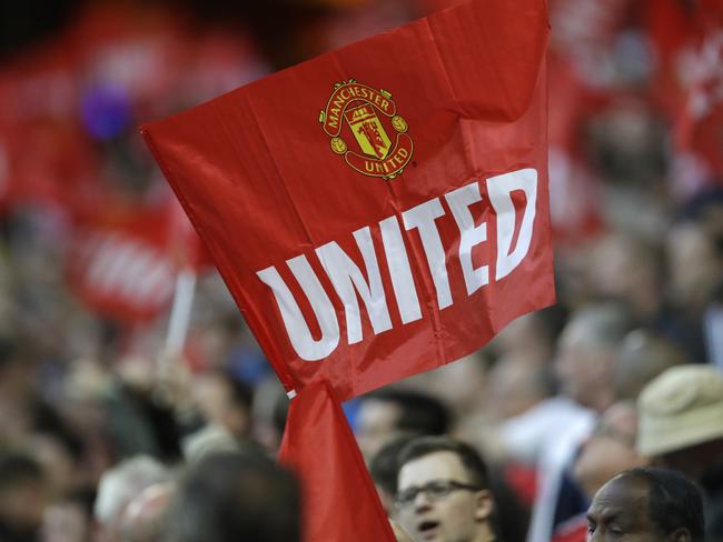 A ManU supporter waves a flag during the soccer Europa League final