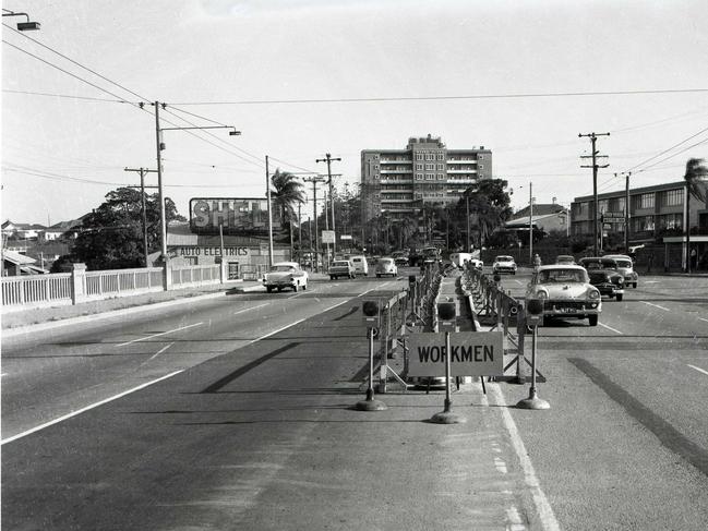 A traffic island under construction at the southern end of the Story Bridge in 1965