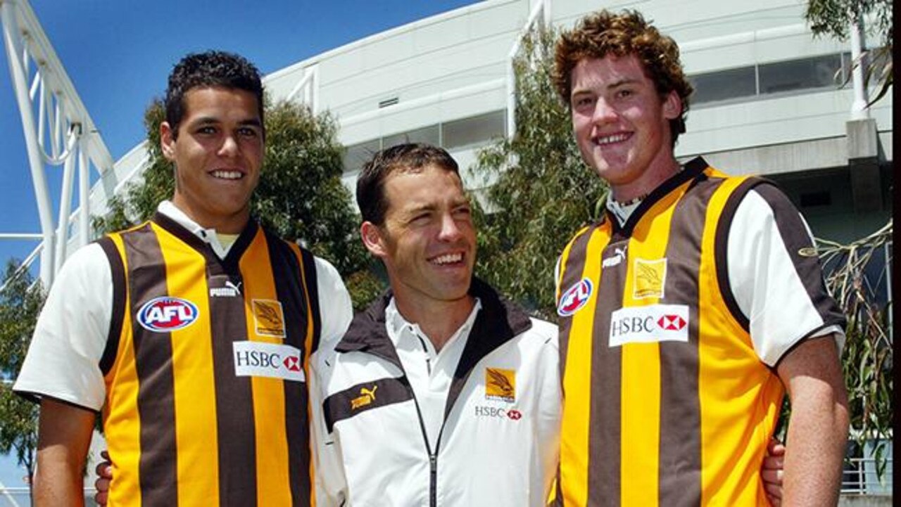 Alastair Clarkson with Lance Franklin and Jarryd Roughead after the 2004 draft.