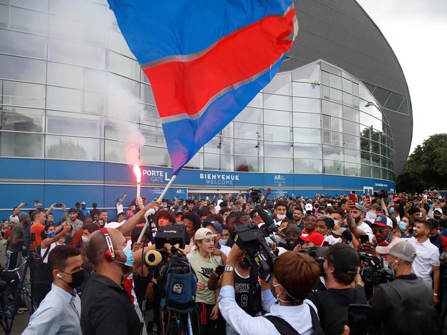 Supporters cheer outside PSG’s Parc des Princes stadium in Paris. Picture: AFP