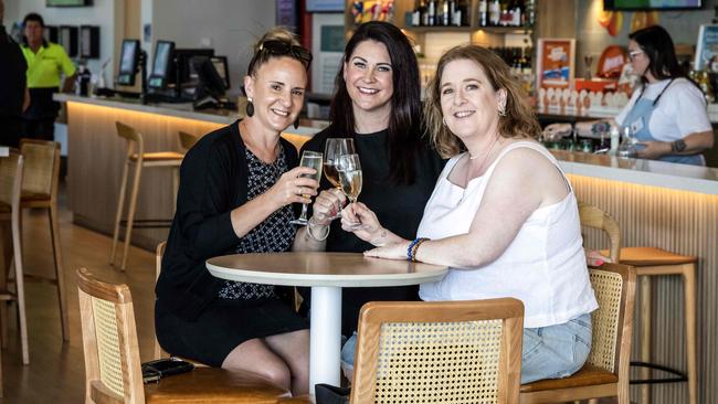 Friends Jacqui Chibnall, Wendy Cahill and Kirsty Monssen toasting the new year at the revamped Christies Beach Hotel. Picture: Kelly Barnes