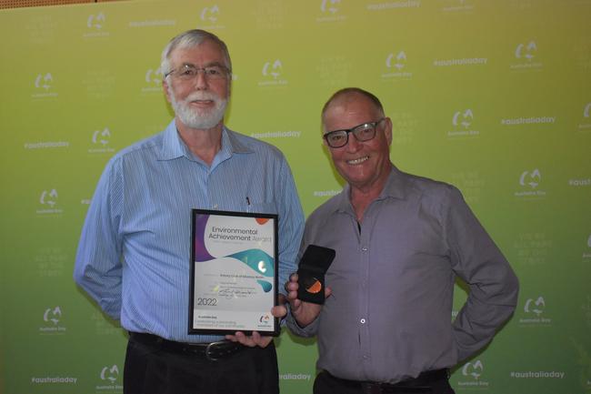Larry Slattery and Dan Davis accepting the Environmental Achievement Award on behalf of the Rotary Club of Mackay North at the Mackay Australia Day awards at the MECC on January 25, 2022. Picture: Lillian Watkins