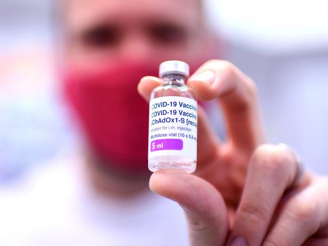 BRISBANE, AUSTRALIA - NewsWire Photos - AUGUST 8, 2021. Pharmacist Michael Thorp holds a vial of the AstraZeneca Covid-19 vaccine the at the Carina Day and Night pharmacy in Brisbane. Picture: NCA NewsWire / Dan Peled