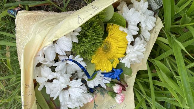 Flowers laid at the intersection where motorcyclist Hayden Webb died.