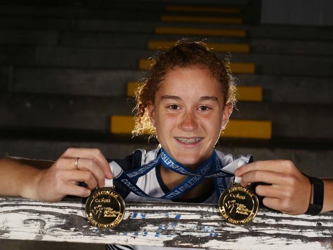 May 11,  hurdler Amber Clarke, who is also a talented footballer, on the athletics track at Knox Little Athletics Club in Knoxfield.Picture: Stuart Milligan