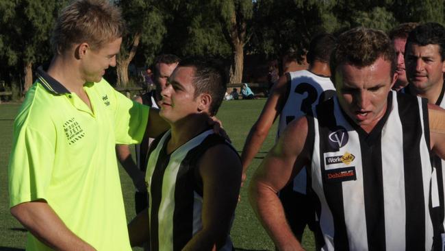 Sylvia visiting old Merbein teammates during a break in the AFL season in 2007.