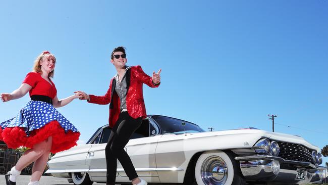 Gearing up for a big Fathers Day weekend of Classic Cars and good times at Carrara Markets are Jake Maloney 23 and Kya Maloney 15 from Rockabilly Australia in front of Milton Watkins' 1961 Cadillac. Picture Glenn Hampson