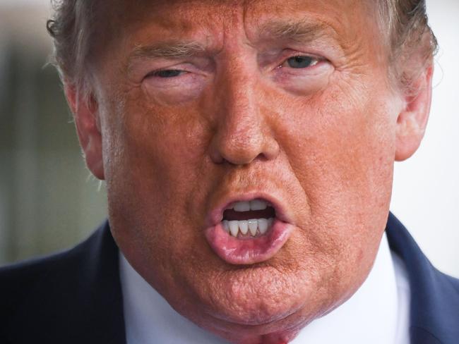 (FILES) In this file photo US President Donald Trump speaks to the press before departing the White House  on June 20, 2020 in Washington, DC, for a campaign rally in Tulsa, Oklahoma. - One of Donald Trump's brothers requested a restraining order to block publication of a potentially explosive book written by the US president's niece, The New York Times reported June 23, 2020. Mary Trump will release her no-holds-barred memoir "Too Much and Never Enough: How My Family Created the World's Most Dangerous Man," on July 28, according to publishing house Simon & Schuster. (Photo by Eric BARADAT / AFP)