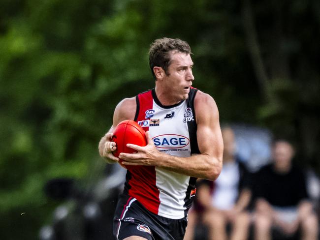 Matt Dennis with ball in hand for Southern Districts in the 2023-24 NTFL season. Picture: Patch Clapp / AFLNT Media