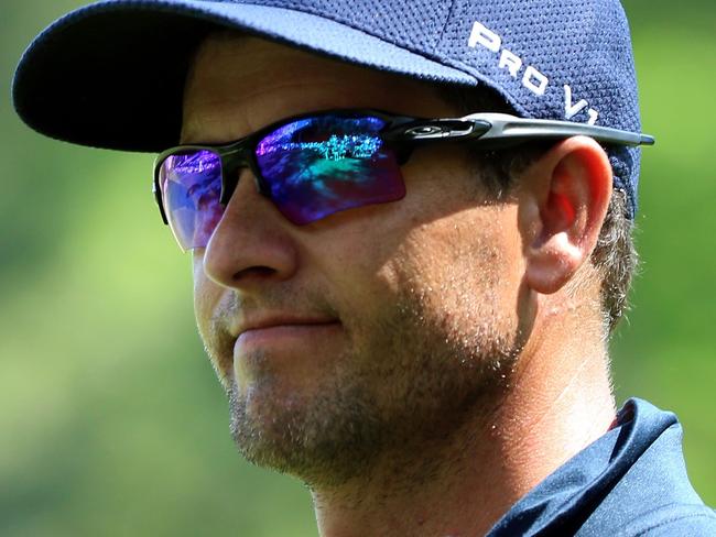 AUGUSTA, GEORGIA - APRIL 07: Adam Scott of Australia reacts on the 13th green during the first round of the 2016 Masters Tournament at Augusta National Golf Club on April 7, 2016 in Augusta, Georgia. Andrew Redington/Getty Images/AFP == FOR NEWSPAPERS, INTERNET, TELCOS & TELEVISION USE ONLY ==