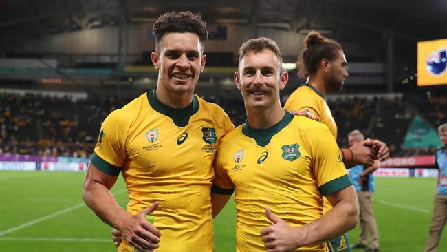 SAPPORO, JAPAN - SEPTEMBER 21: Matt To'omua and Nic White of Australia pose for a photo following the Rugby World Cup 2019 Group D game between Australia and Fiji at Sapporo Dome on September 21, 2019 in Sapporo, Hokkaido, Japan. (Photo by Dan Mullan/Getty Images)