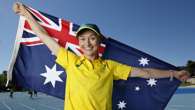 Hull poses with the Australian flag ahead of the Paris Olympic Games. Pic: Michael Klein