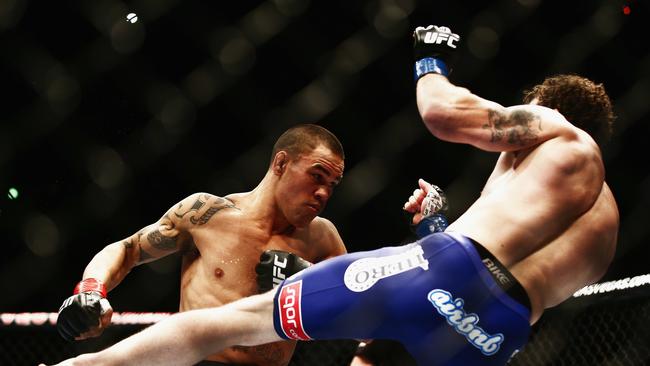 Australian UFC pioneer Jamie Te Huna trades with Nate Marquardt back in 2014. (Photo by Hannah Peters/Getty Images)