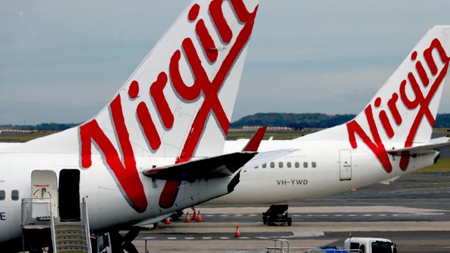 SYDNEY, AUSTRALIA - NewsWire Photos - SEPTEMBER 09, 2022: General generic editorial stock image of Virgin airplane at Sydney Domestic Airport. Picture: NCA NewsWire / Nicholas Eagar