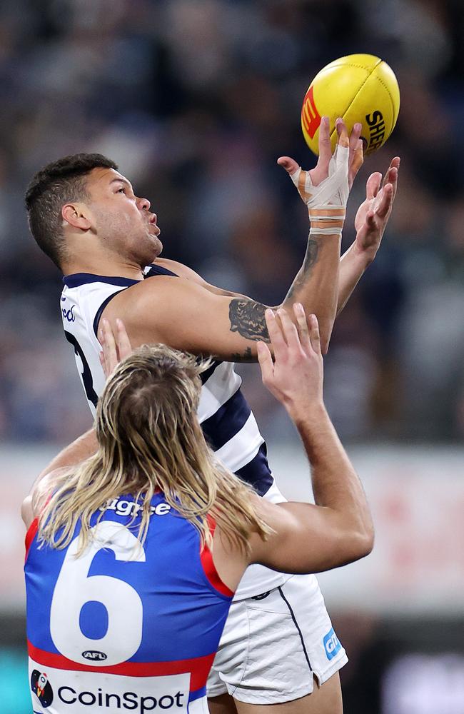 Brandan Parfitt attempts to mark. Picture: Mark Stewart