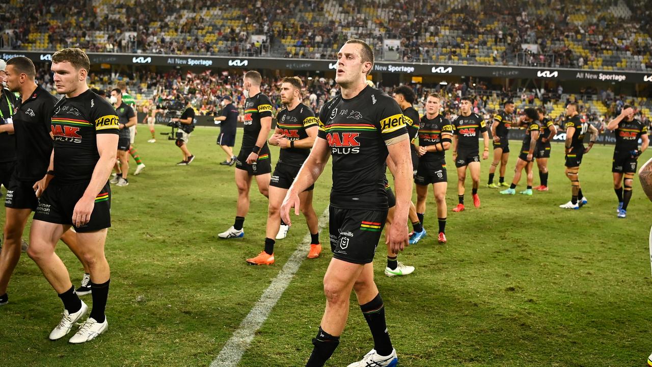 The Panthers trudge off dejected. Photo by Ian Hitchcock/Getty Images