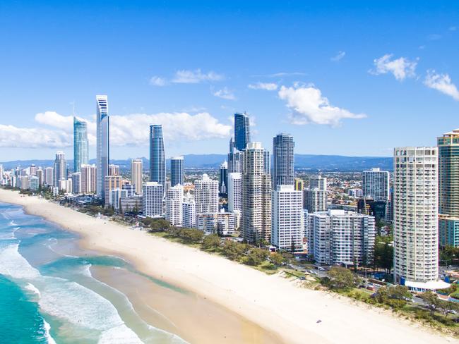 An aerial view of the Surfers Paradise skyline on a clear day in Queensland, Australia