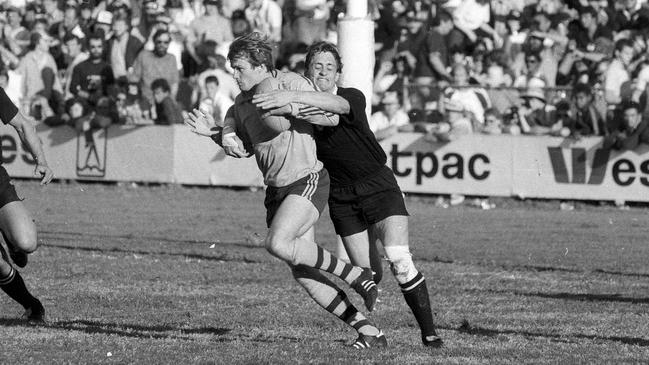 Wallabies inside centre Michael Hawker takes on the All Blacks at Ballymore in 1984 - the day after he was spooked by Indiana Jones and the Temple of Doom.