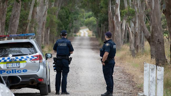 Police man a roadblock on Davies Rd, Parkham