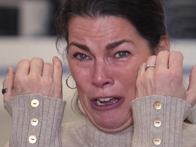 Former Olympic skater Nancy Kerrigan tries to hold back her emotions while addressing the media at The Skating Club of Boston, where six members of the club's community, including athletes, coaches and family, were killed in an airplane collision with a helicopter on Wednesday in Washington, Thursday, Jan. 30, 2025, in Norwood, Mass.  (AP Photo/Charles Krupa)