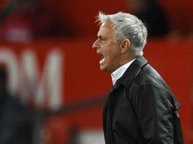 Manchester United's Portuguese manager Jose Mourinho gestures from the touchline after the final whistle in the English Premier League football match between Manchester United and Tottenham Hotspur at Old Trafford in Manchester, north west England, on August 27, 2018. (Photo by Oli SCARFF / AFP) / RESTRICTED TO EDITORIAL USE. No use with unauthorized audio, video, data, fixture lists, club/league logos or 'live' services. Online in-match use limited to 120 images. An additional 40 images may be used in extra time. No video emulation. Social media in-match use limited to 120 images. An additional 40 images may be used in extra time. No use in betting publications, games or single club/league/player publications. /