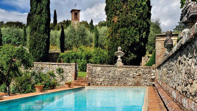 Villa Cetinale’s pool is built on the site of the old reservoir and surrounded by ancient stone walls. Picture: Simon Upton