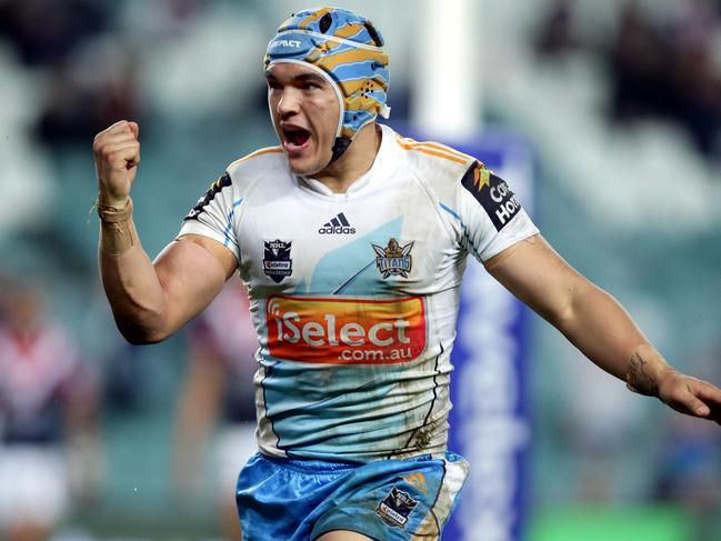 Former Titans hooker Matt Srama celebrates a try against the Roosters in 2012. Picture: Gregg Porteous