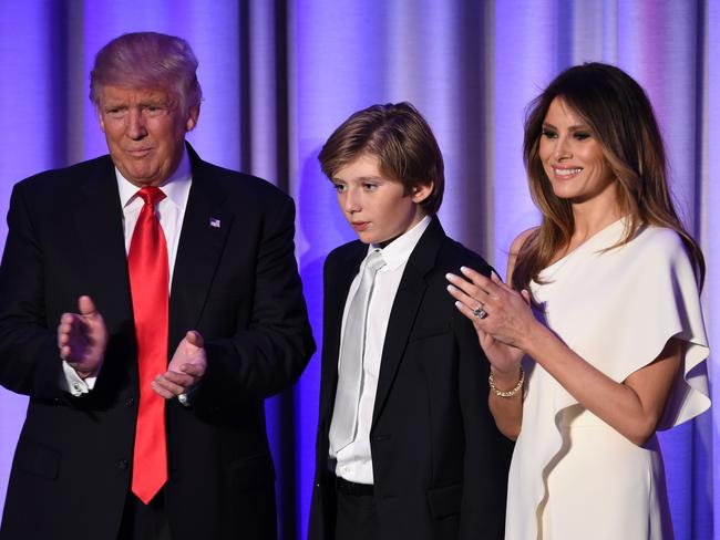 US President-elect Donald Trump arrives with his son Baron and wife Melania. Picture: AFP / Saul Loeb