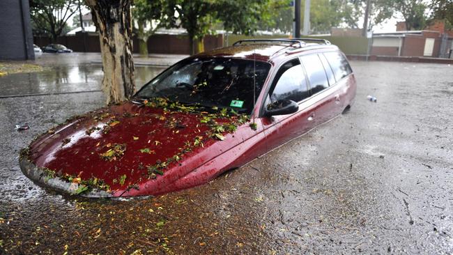 A car is inundated in Gracie St North Melbourne on March 6 2010.