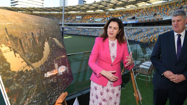 Queensland Premier Annastacia Palaszczuk and Minister for Sport Stirling Hinchliffe look at artist impressions for the rebuild of The Gabba in Brisbane, being the proposed main stadium should Queensland host the 2032 Olympic and Paralympic Games. Picture: NCA NewsWire/Dan Peled.