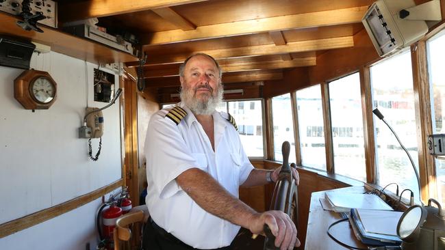 Former Cartela skipper Michael Roche in 2014 taking the ship from the Brooke Street Pier in Hobart to Franklin.