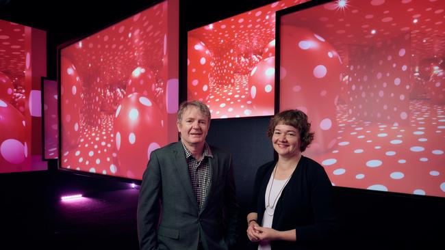 Curators Wayne Crothers and Miranda Wallace with Yayoi Kusama’s Revelation from Heaven 1989. Picture: Eugene Hyland