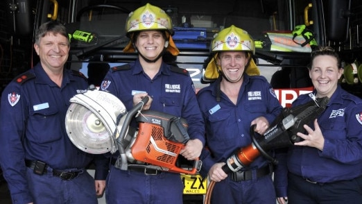 Ken Maxwell (left) pictured with other New South Wales Fire and Rescue staff.