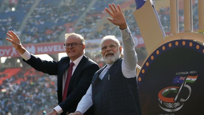 ‘Working together’ … Anthony Albanese and Indian Prime Minister Narendra Modi wave to spectators in Ahmedabad ahead of the fourth Test. Picture: AFP