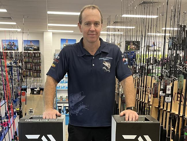 07/07/2023 - Mr Voukolos with the Zero Waste boxes that will be placed at the front of Fishing and Outdoor World Picture: Holly Headon