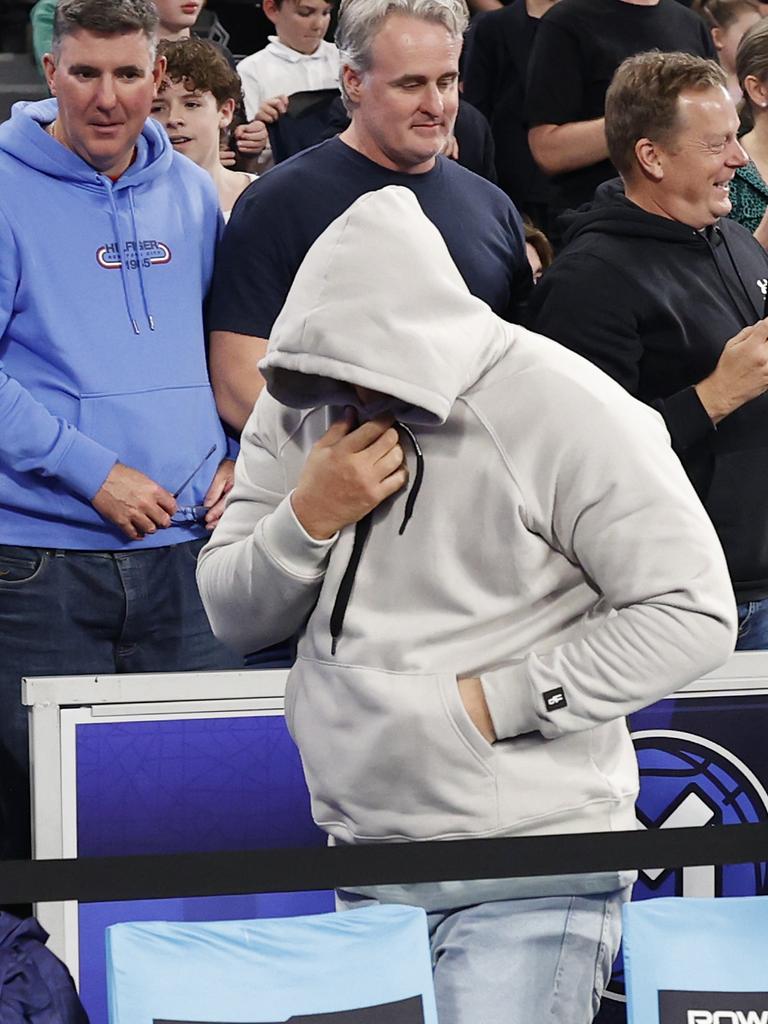 The man in the grey hoodie was a guest invited by courtside seat holder Allen Ibrahim. Picture: Darrian Traynor/Getty Images