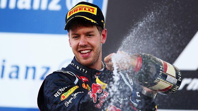 Sebastian Vettel celebrates after winning the Japanese Formula One Grand Prix at the Suzuka Circuit.