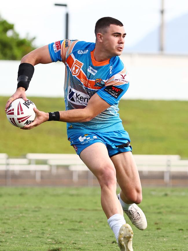 Pride's Jake Clifford looks to pass to score a try in the Hostplus Cup Queensland Rugby League (QRL) match between the Northern Pride and the Sunshine Coast Falcons, held at Barlow Park, Cairns Picture: Brendan Radke