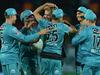 Laidley-bred all-rounder Jack Wood is congratulated by Brisbane Heat teammates after taking the wicket of Melbourne Stars batsman Ben Dunk during his BBL debut in Canberra. Picture: Brett Hemmings/Getty Images