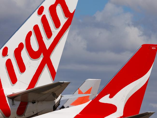 Townsville, Queensland - 28 July 2021: Virgin Australia, Qantas and Jetstar tails on display at Townsville Airport in far North Queensland27 October 2024Kendall HillPhoto - iStock